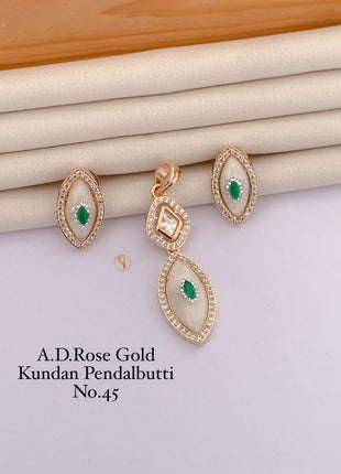 Dual-Tone Kundan Pendant Set with Pink Accents
