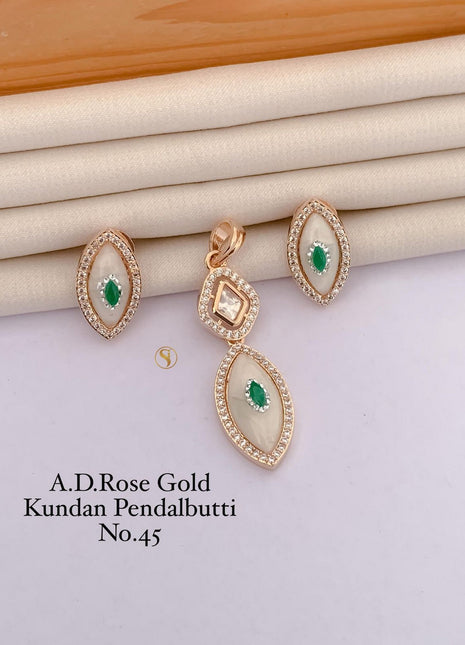 Dual-Tone Kundan Pendant Set with Pink Accents