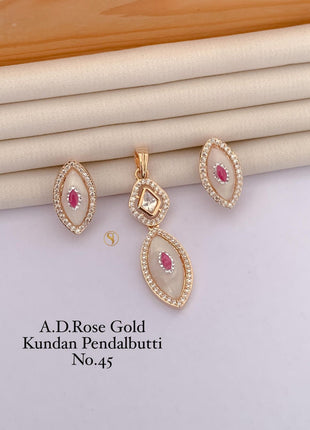 Dual-Tone Kundan Pendant Set with Pink Accents