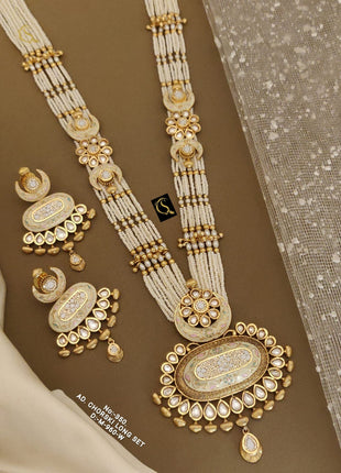Kundan Style Pendant Set with Maroon and Green Stones
