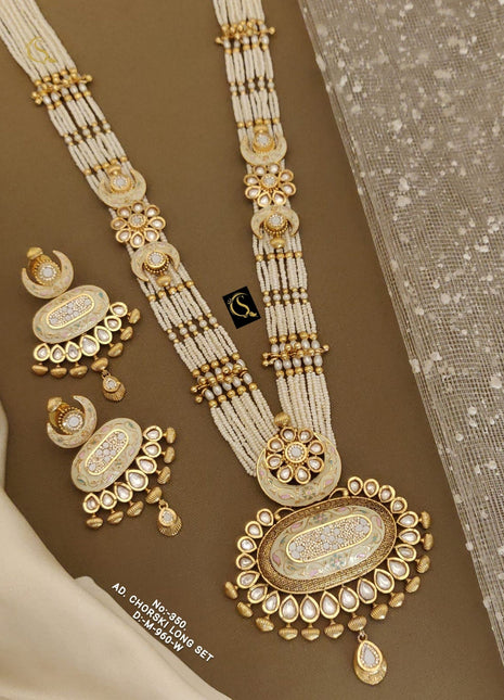 Kundan Style Pendant Set with Maroon and Green Stones