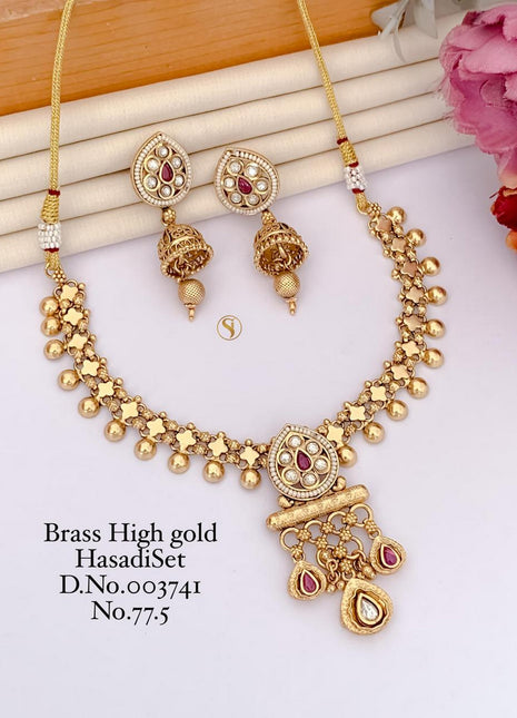 Ornate Gold-Tone Pendant Set with Red and Green Stones