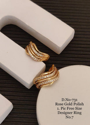 Gold Ring with Green Stones and Pearl Detailing