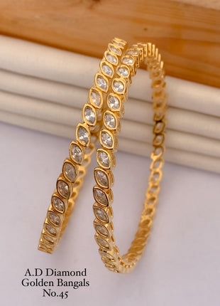 Monzonite Studded Gold Bangles